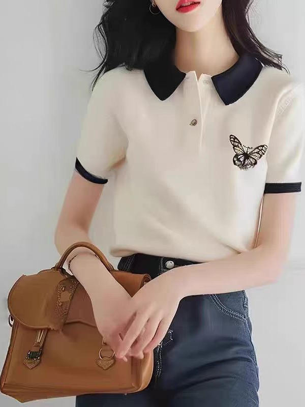 Áo thun nữ cổ polo tay ngắn trắng đơn giản họa tiết bướm — Màu trắng