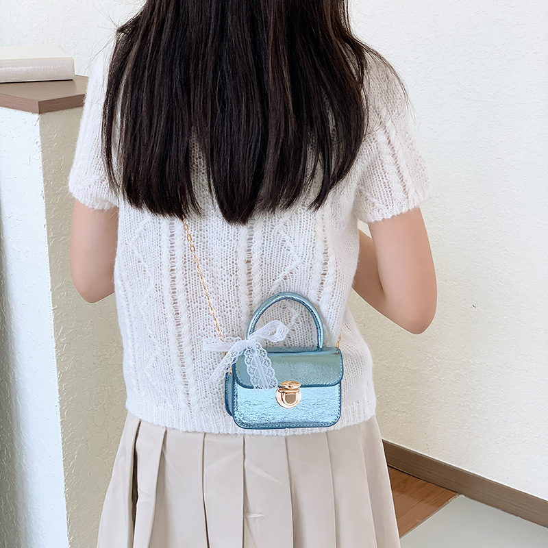 2026 bolso de niña pequeña mini bolso de cadena simple de color sólido bolso coreano nuevo bolso de cambio para niños