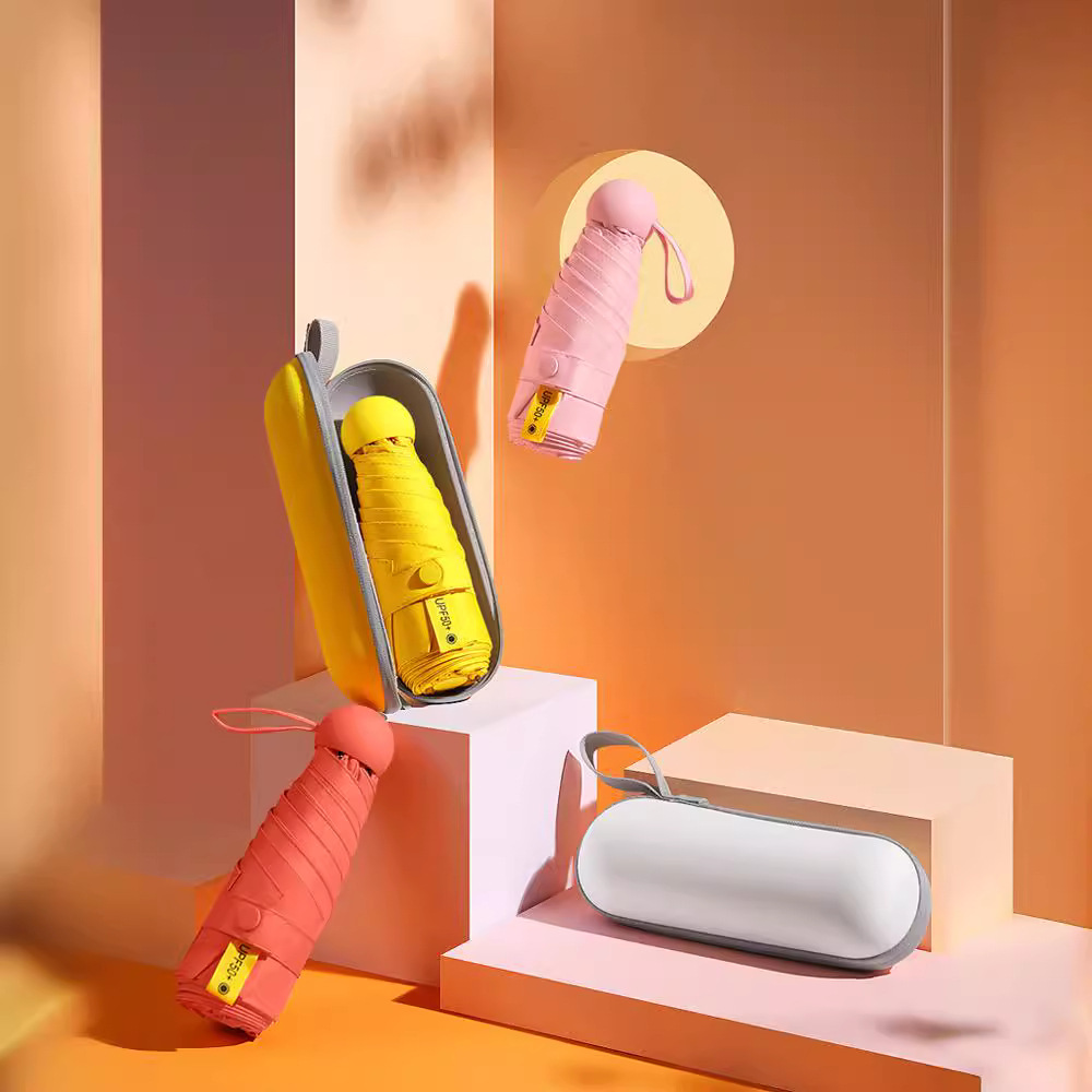 Ultra ligero Mini cinco veces ocho huesos cápsula paraguas pegamento negro protección solar lluvia doble uso plegable paraguas publicidad bolsillo paraguas impreso logotipo