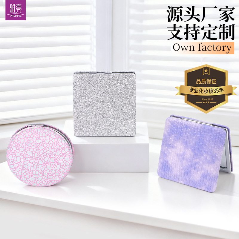 Polvo brillante de maquillaje de alta calidad cobra portátil bolsas espejo de maquillaje espejo al por mayor pequeño regalo mini espejo