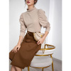 Medium length irregular A-line skirt looks thin