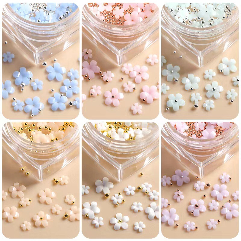 Nail art light change five-petal flower jewelry three-dimensional color change small white flower boxed resin flower with steel ball nail drill mixed