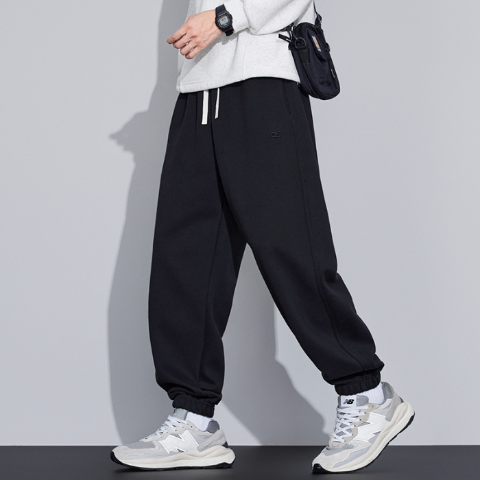 2025 nuevo estilo primavera y otoño suelto pie rectas bordado pantalones masculinos japoneses retro suelto pantalones de tendencia versátil