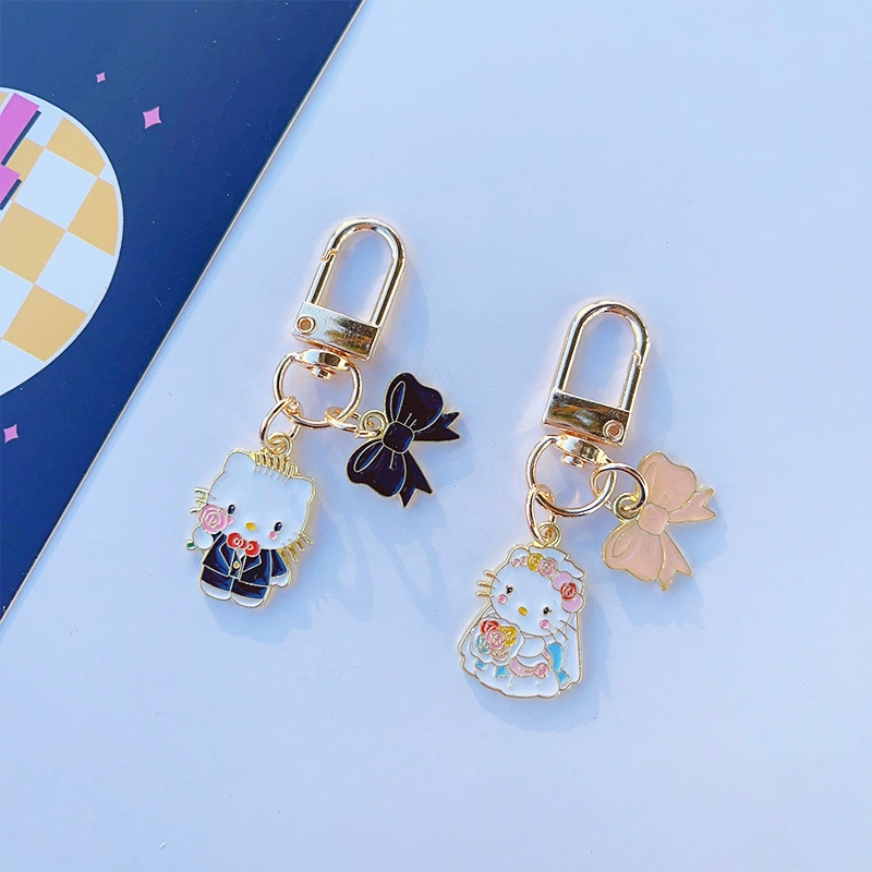 Брелок Hello Kitty свадебная пара эмалированный металл, подвески невеста и жених, 8×6 см