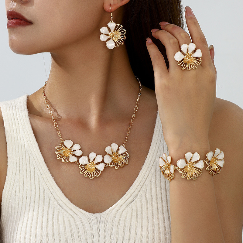 Estilo explosivo transfronterizo retro aceite que gotea collar de flores pulsera aretes conjunto de joyas asimétricas frescas y dulces