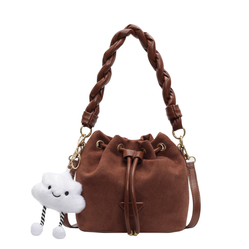 Moda esmerilado diseño de la abertura de la bolsa de cubo de mano mujer otoño y invierno 2025 nuevo estilo popular bolso de hombro universal