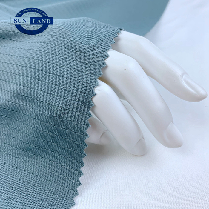 羽毛球服面料全涤单面提花网眼布透气镂空骑行网布银离子抗菌