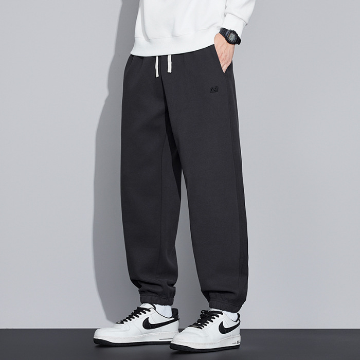 2025 nuevo estilo primavera y otoño suelto pie rectas bordado pantalones masculinos japoneses retro suelto pantalones de tendencia versátil