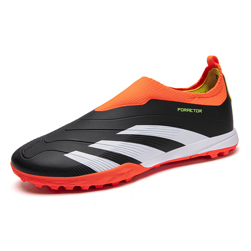 Zapatos de fútbol transfronterizos sin costuras cortados tf clavos de clavos adultos AG clavos niños y niñas zapatos de entrenamiento de estudiantes al por mayor