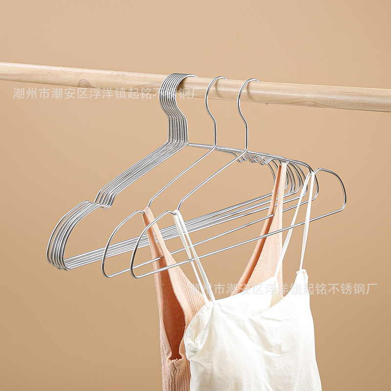 10つの荘304ステンレスの服の棚の卸売りは服の棚の家庭用成人の子供の防風の金属のハンガーを干します。|undefined