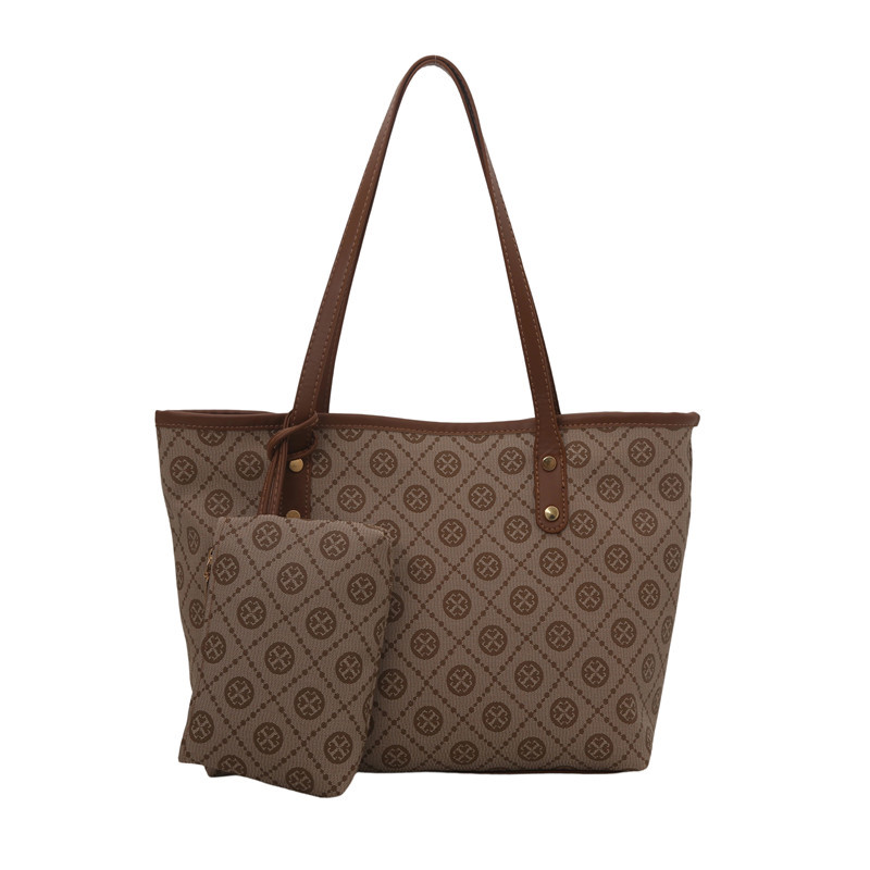 Nicho de diseño de alta sensación 2025 nueva moda versátil gran capacidad de hombro portátil bolso de mano de mujer