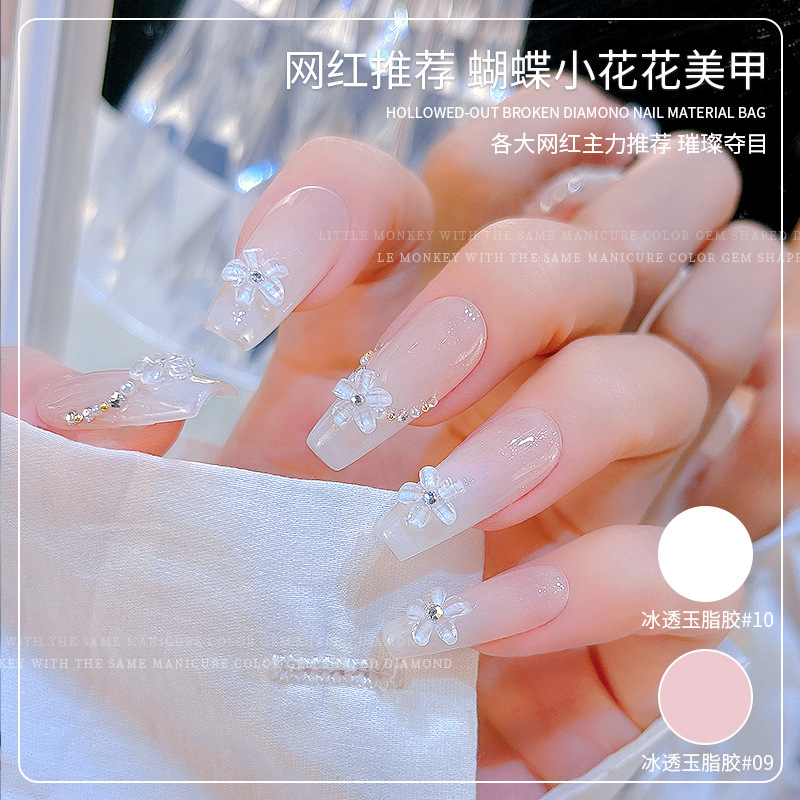 Arte de uñas popular de cinco pétalos flor de la joyería bola de acero mezclado hielo transparente suave rosa pequeña flor Camelia flor decoración de uñas