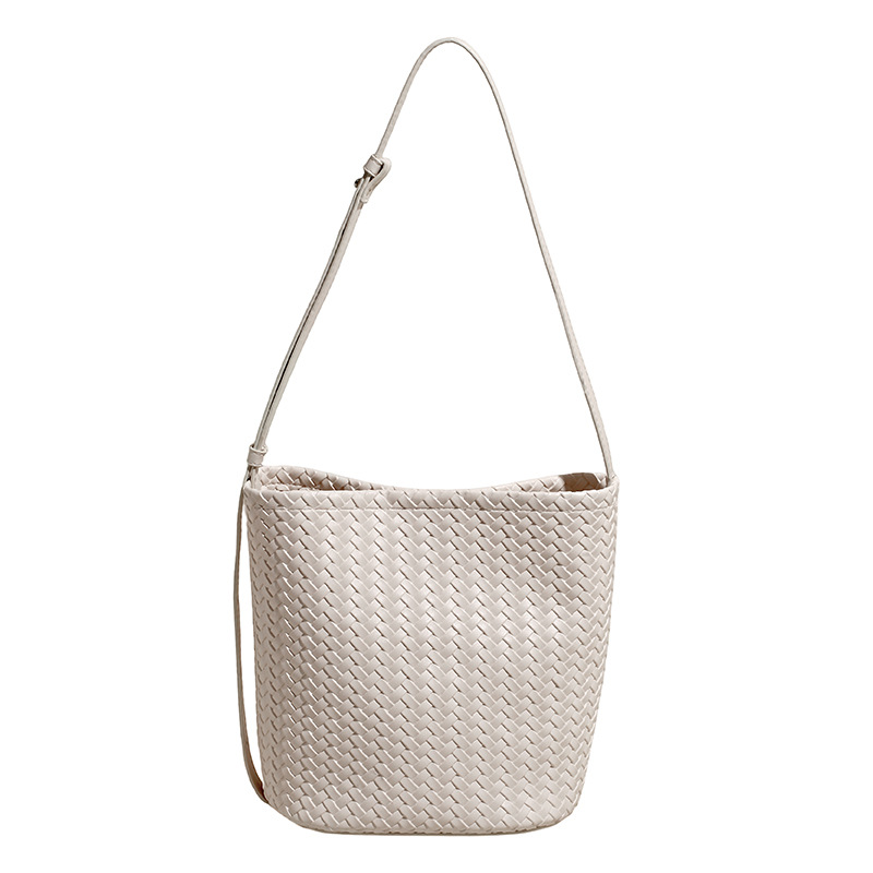 Bolso de cubo de textura transfronteriza 2025 verano nuevo bolso femenino retro tejido patrón bandolera moda niño-madre bandolera
