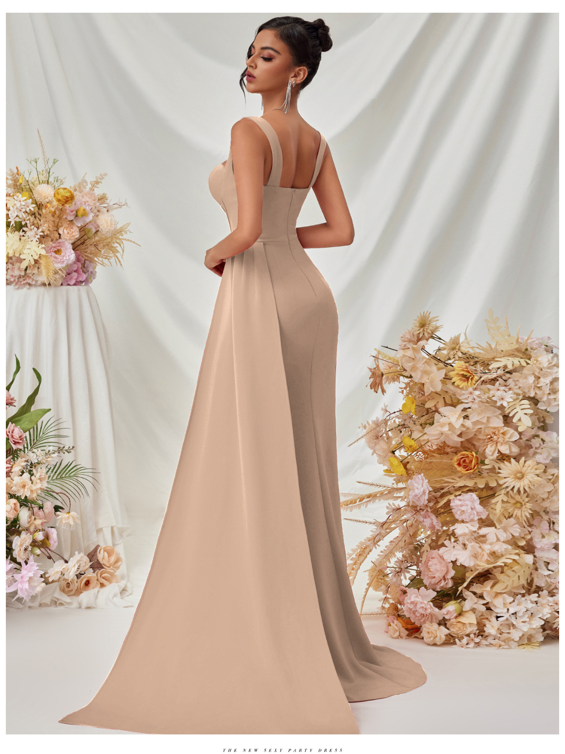 Nuevo vestido de noche sexy dividido de estilo europeo y americano, vestido largo con tirantes delgados de cadera de temperamento femenino de alta gama en stock