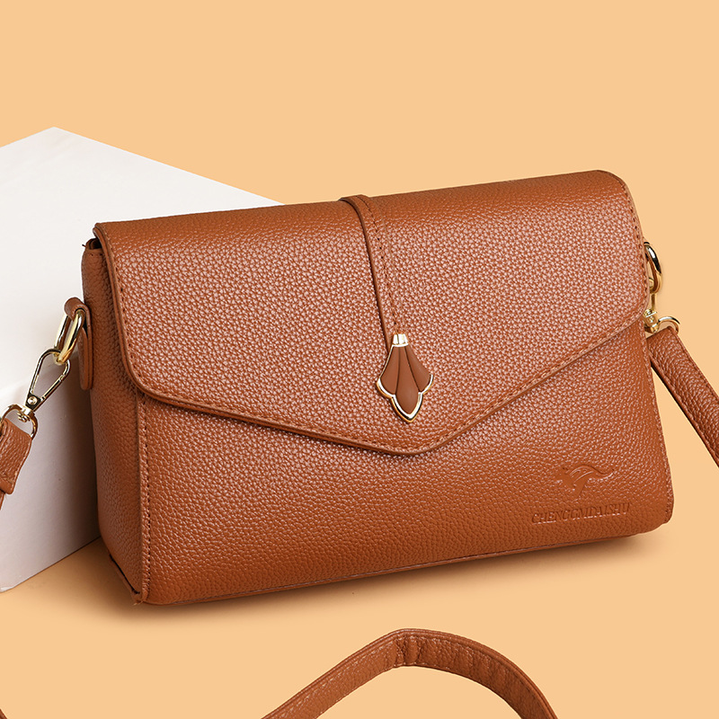 Bolso de moda para mujeres 2026 nuevo bolso pequeño de cuero suave bolso de madres de mediana edad bolso de hombro de gran capacidad bolso de mochila