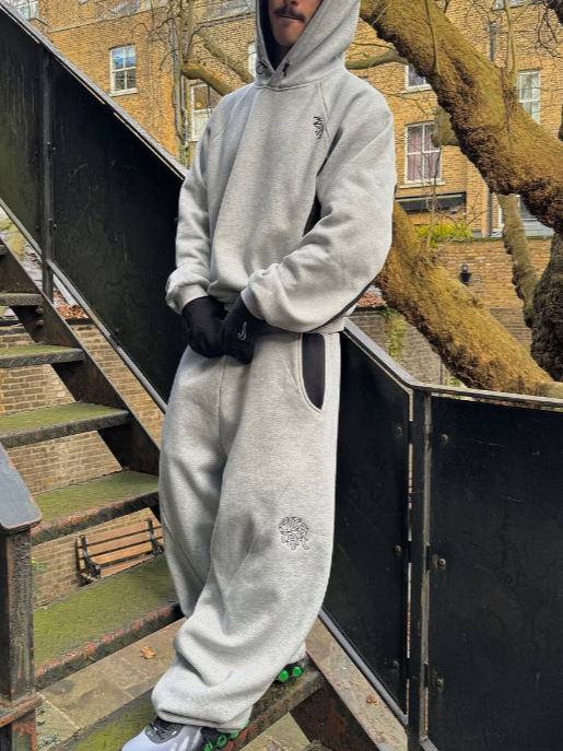 Europa y Estados Unidos transfronterizos americanos retro versátil suelto hip-hop empalme bordado pantalones de hombre comercio exterior