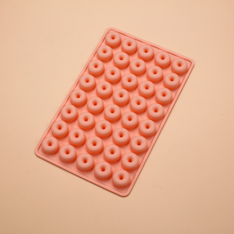 Fábrica en stock calidad alimentaria amor hueso donut QQ Caramelo Suave molde DIY silicona hecho a mano suplemento alimenticio molde