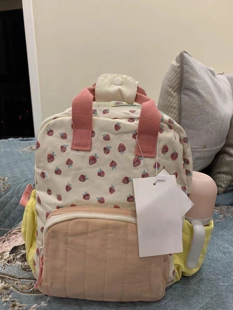 2023 Nuova borsa da scuola per ragazze con stampa di fragole in tela Dopamine Wear Zaino con colori a contrasto per ragazze dell'asilo_voghion.com