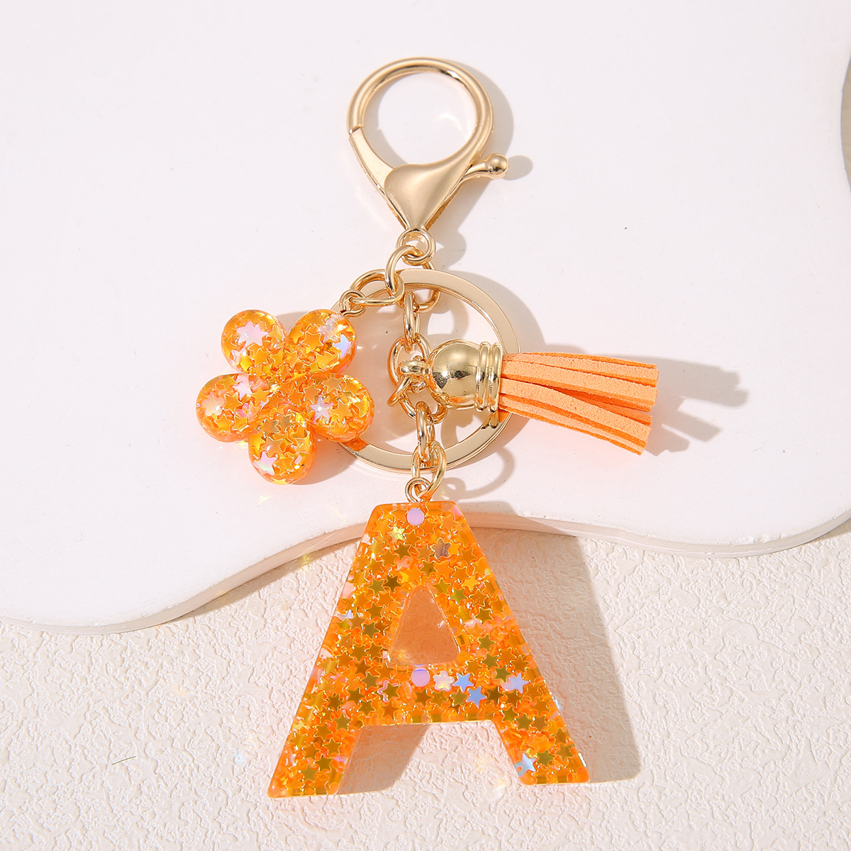 Mayorista Amazon Stanley Cup Chain Keychain Joyería de goteo de gel sequilla flores letras de estrellas llavero mujer