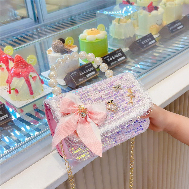 Bolso de hombro de los niños nuevo comercio exterior al por mayor bolso de La Perla de las niñas moda coreana pequeña princesa lentejuelas bolsa de mensajero