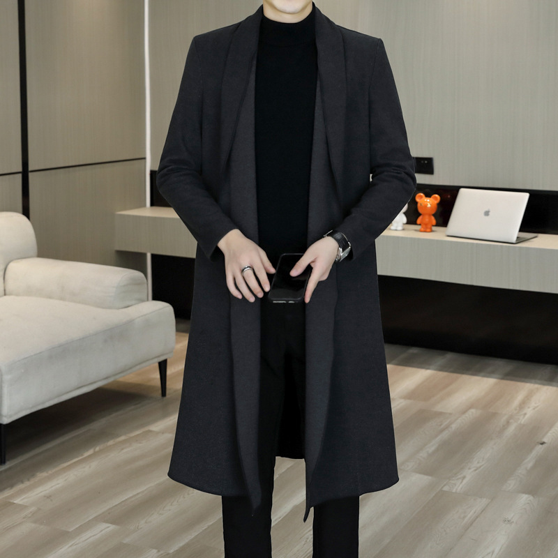 非主流のトレンチコートの男性の新型男性の長い版は膝のカーディガンのコートの中で青年のファッションの長い弾力のコートを過ぎます。