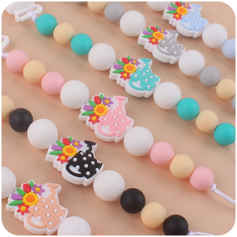 Bebé suministros de dibujos animados florero de silicona pequeño mordedor creativo DIY calmante bebé mordedura molar anti-gota cadena
