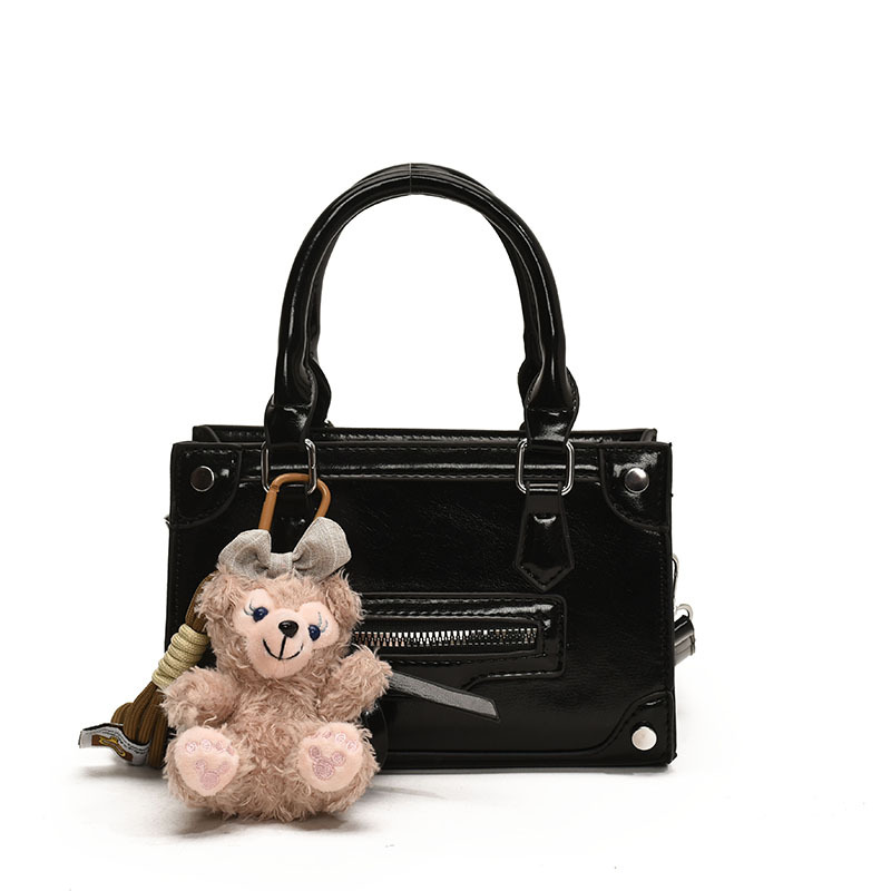 Inglés estilo retro bolsa de motocicleta mujer 2025 nueva moda bolsos de mano de moda bolsos personales de hombro