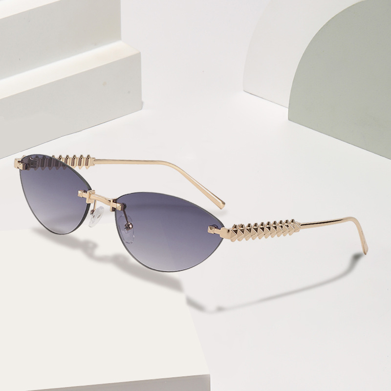Metálico transfronterizo Europa y América de moda gafas de sol con ojos de gato, gafas de sol sin marco, gafas de sol personales