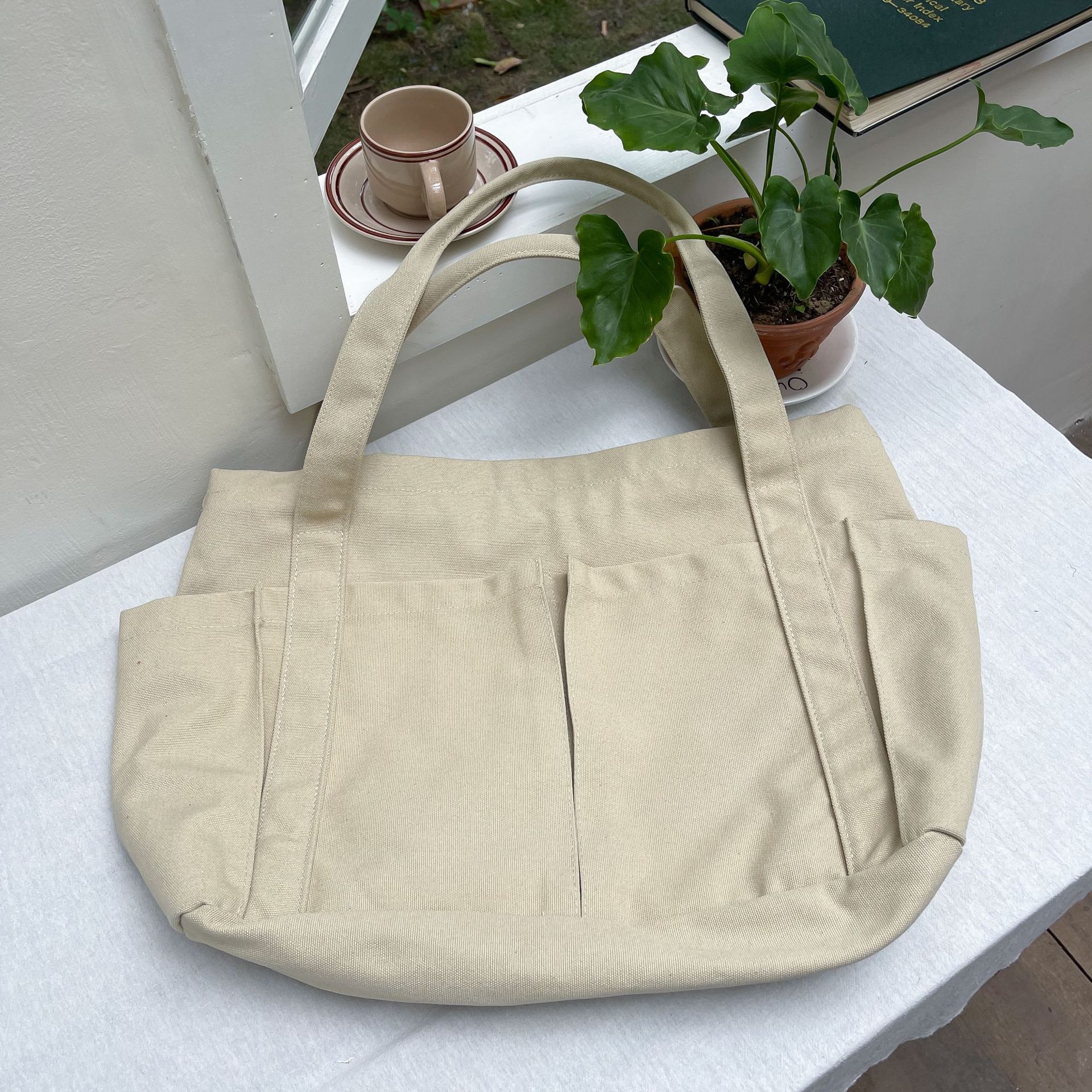Estilo coreano casual color sólido Internet celebridad moda bolsa de tela simple moda de gran capacidad todo fósforo de las mujeres solo hombro bolsa de lona