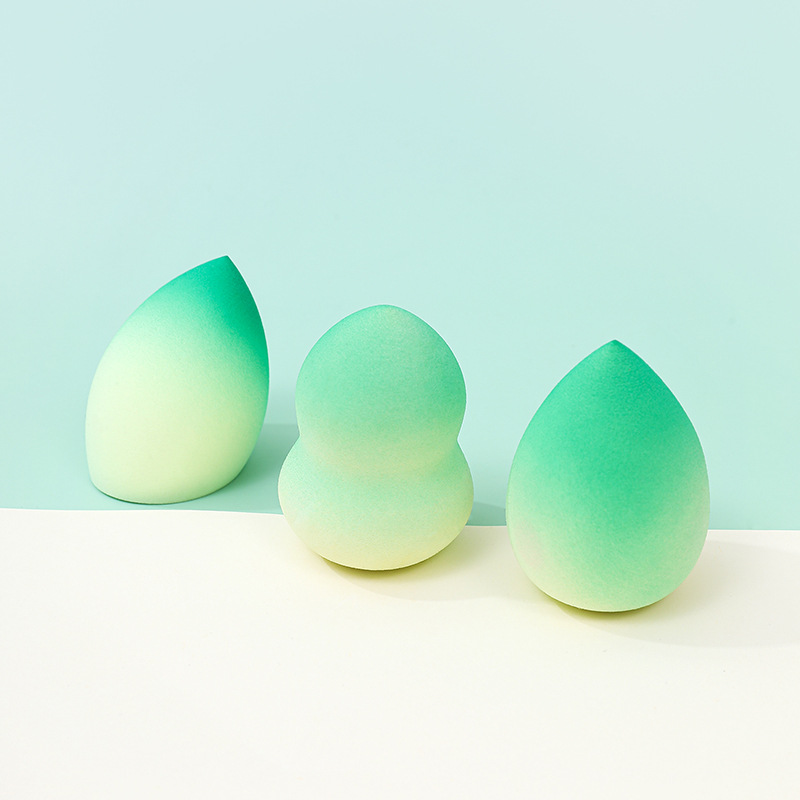 Fábrica personalizada de color degradado transfronterizo maquillaje de belleza huevo soplo de polvo no látex color en aerosol color mixto maquillaje esponja maquillaje huevo al por mayor