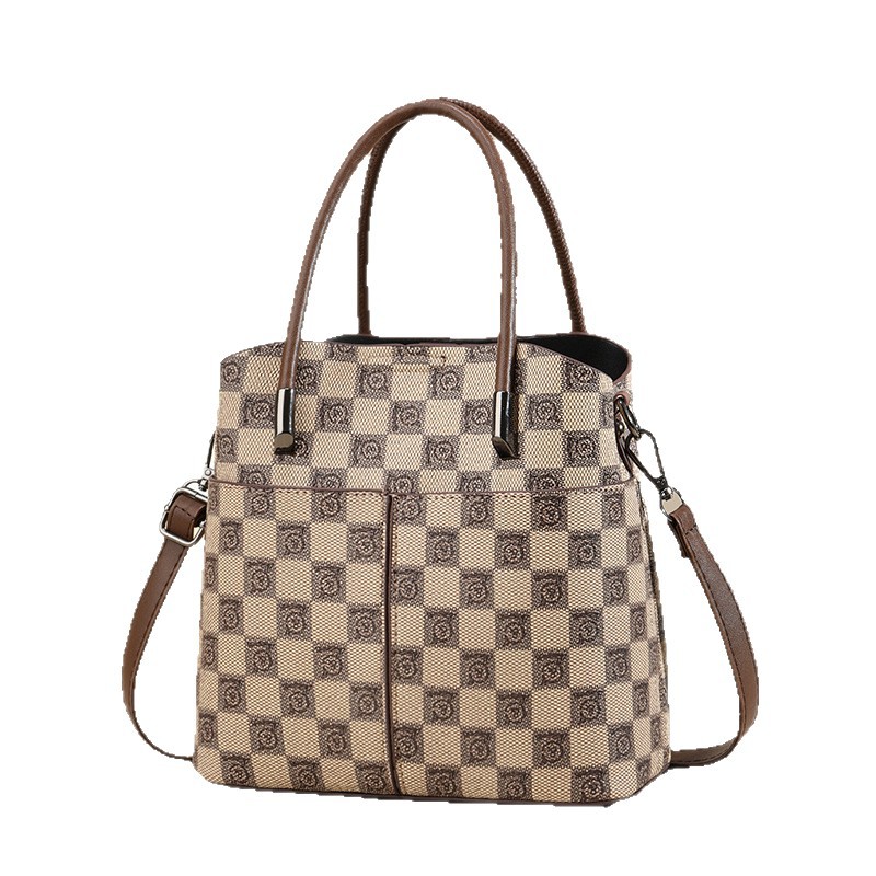 Bolso de lujo ligero de moda 2025, nuevo temperamento bolso de cubo popular, bolso de hombro único, bolso de mano