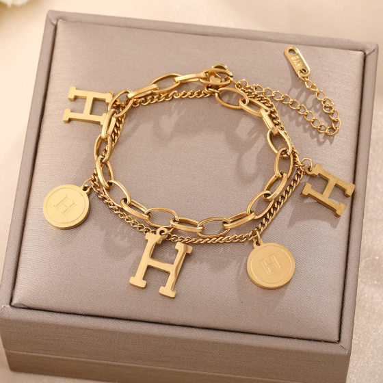 Korean-style fashion simple luxury all-body titanium steel bracelet women's high-end sense diamond-encrusted four-leaf clover cross-border jewelry does not fade