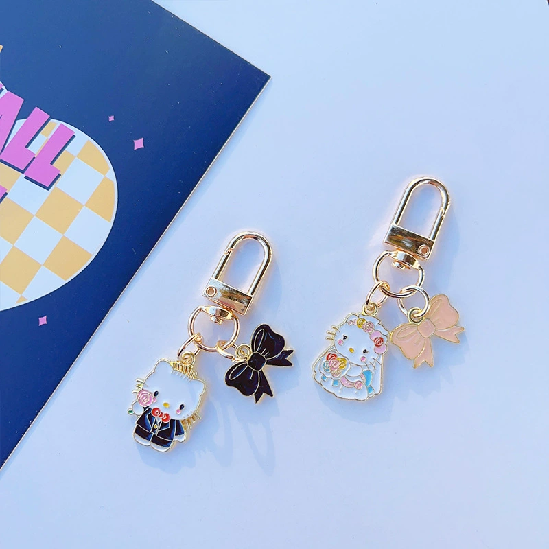 Брелок Hello Kitty свадебная пара эмалированный металл, подвески невеста и жених, 8×6 см