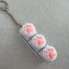 Three-button transparent shell-vertical white cat claw-snake bone chain