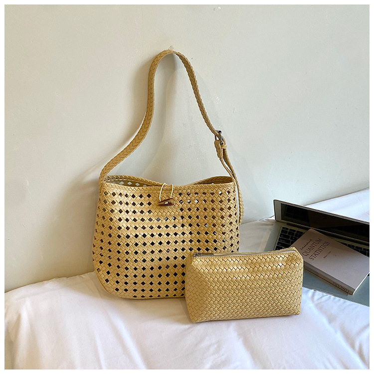Bolsa de tejido hueco de gran capacidad para mujeres 2026 verano nuevo estilo coreano simple bolso de brazo de viaje bolsa de ocio