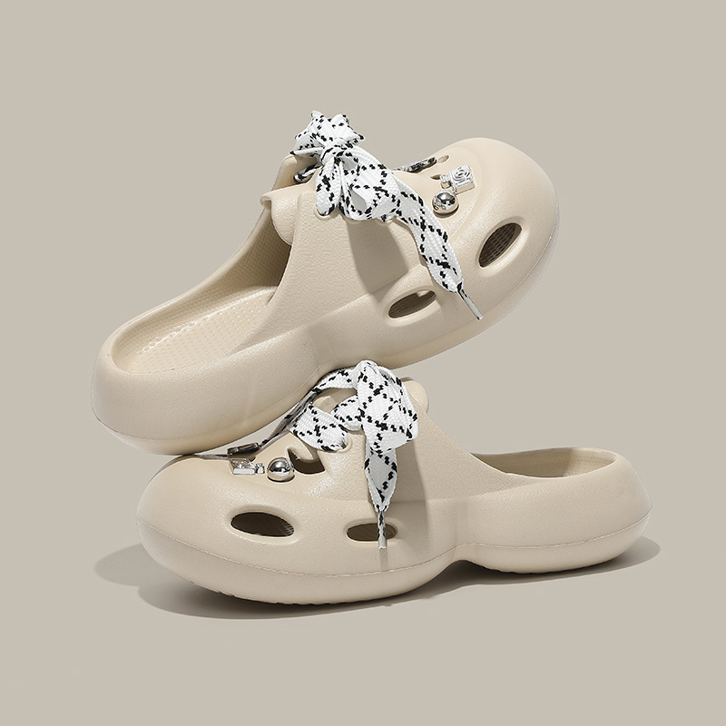 En nombre de la bowknot pisando la mierda, zapatos con agujeros, verano de mujer 2025, nuevo estilo, sandalias y pantuflas de suela gruesa, moda femenina