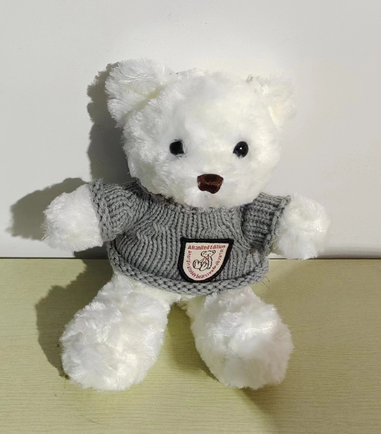 Lindo suéter oso muñeca peluche peluche oso muñeca regalo de cumpleaños máquina de captura muñeca al por mayor transfronteriza