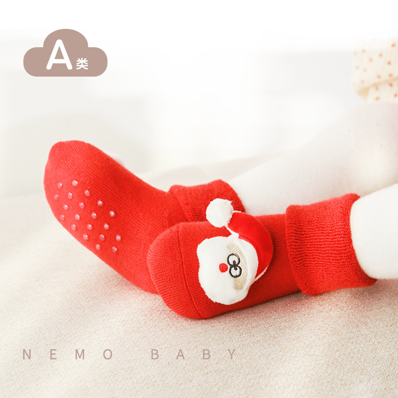 Invierno nuevo bucle engrosado calcetines bebés dispensando pegamento antideslizante calcetines de piso para niños calcetines de muñeca de dibujos animados de Navidad