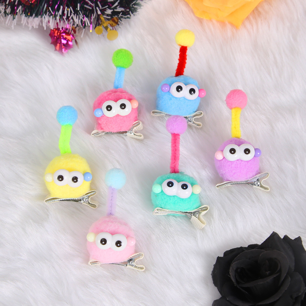 Nuevos niños lindos brocas de pelo de bola de carbón dopamina colorida antena muñeca brocas de pelo extrañas bolas de pelo de ojos grandes