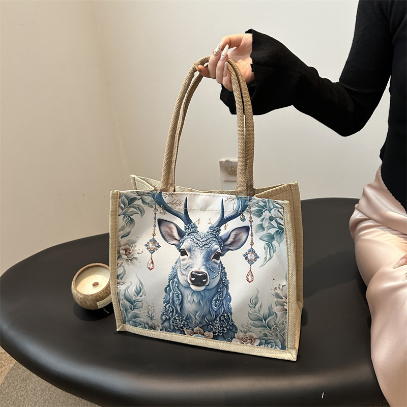 Nueva moda bolsa de lona casual bolso de moda bolso de mujer para salir al trabajo bolso de nicho bolso de almuerzo bolso de estudiantes