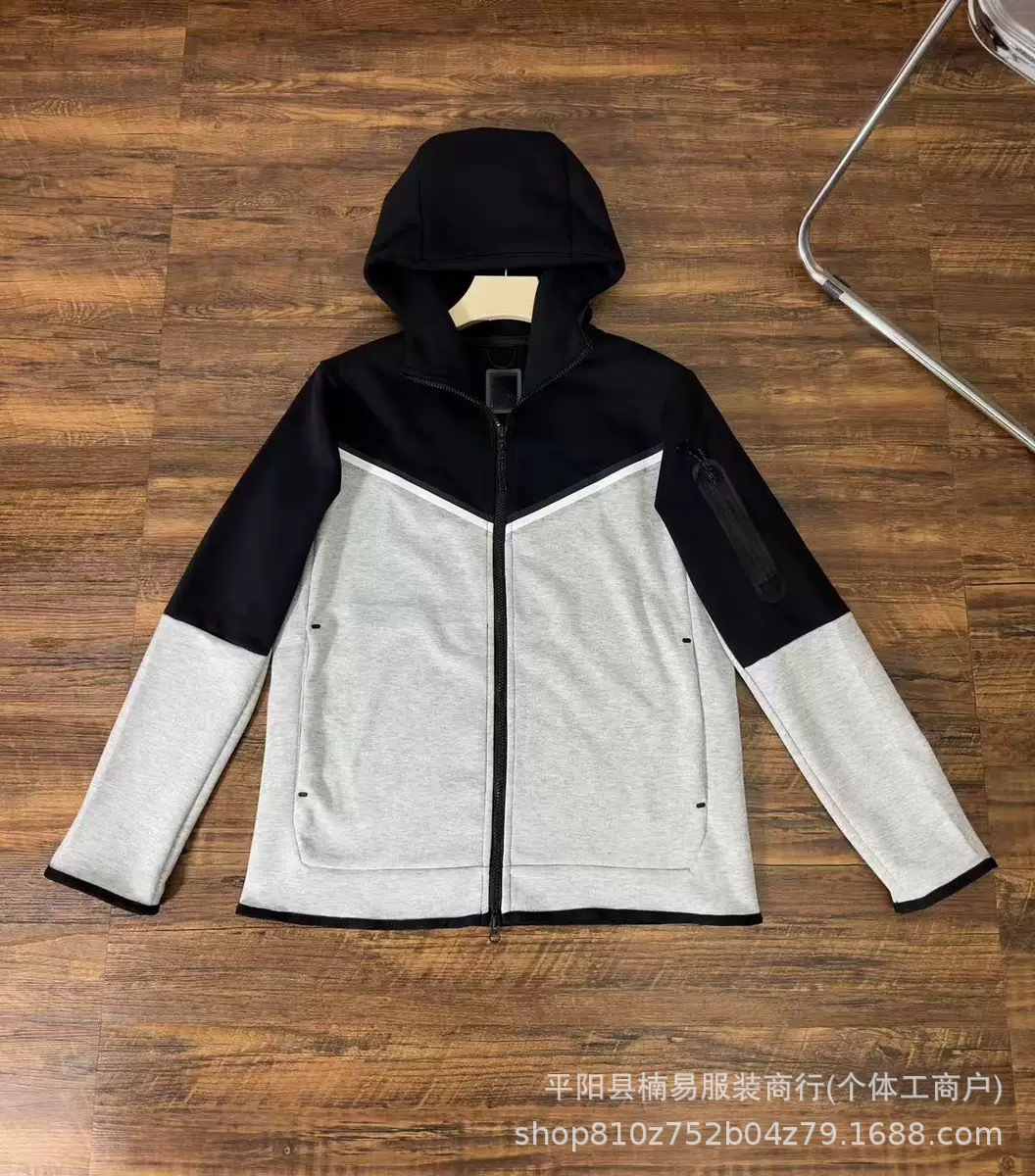 Áo khoác nửa tay màu đen và xám nhạt / M