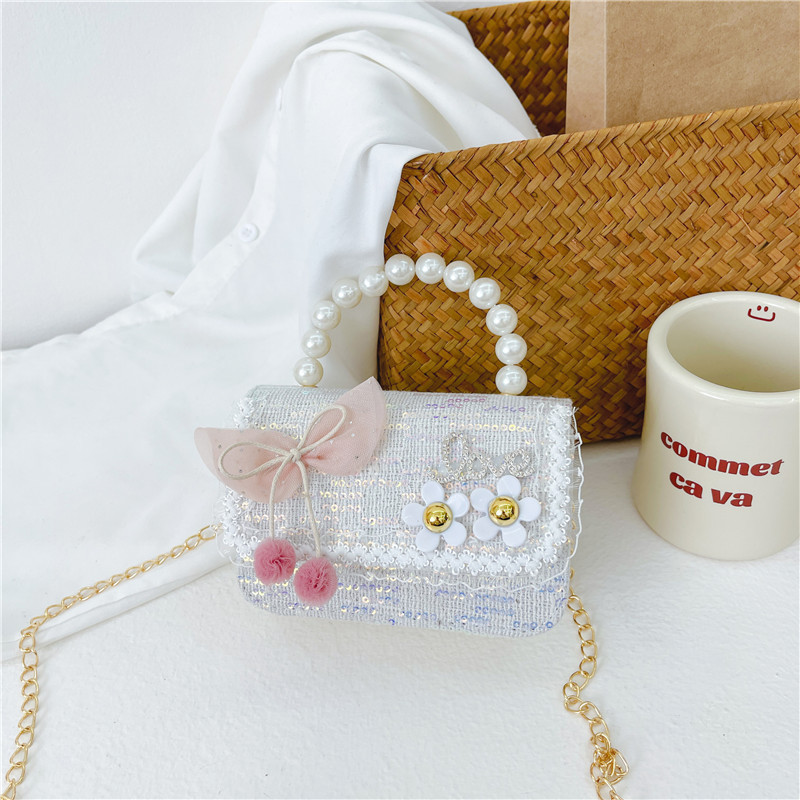 Bolso de hombro de los niños nuevo comercio exterior al por mayor bolso de La Perla de las niñas moda coreana pequeña princesa lentejuelas bolsa de mensajero