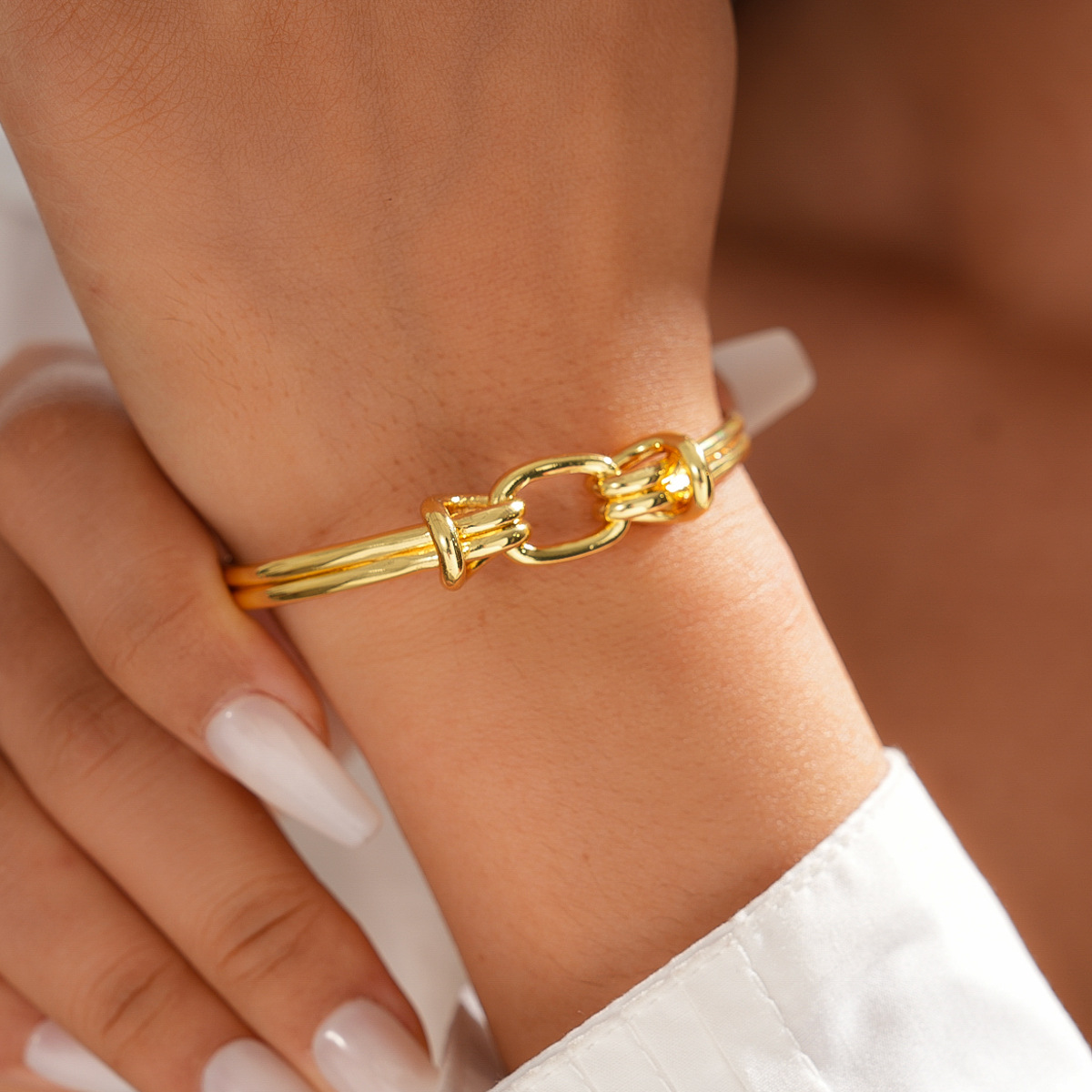 18k oro galvanizado europeo y americano oval hueco nudo abierto pulsera de moda nicho de viaje de alta calidad joyería