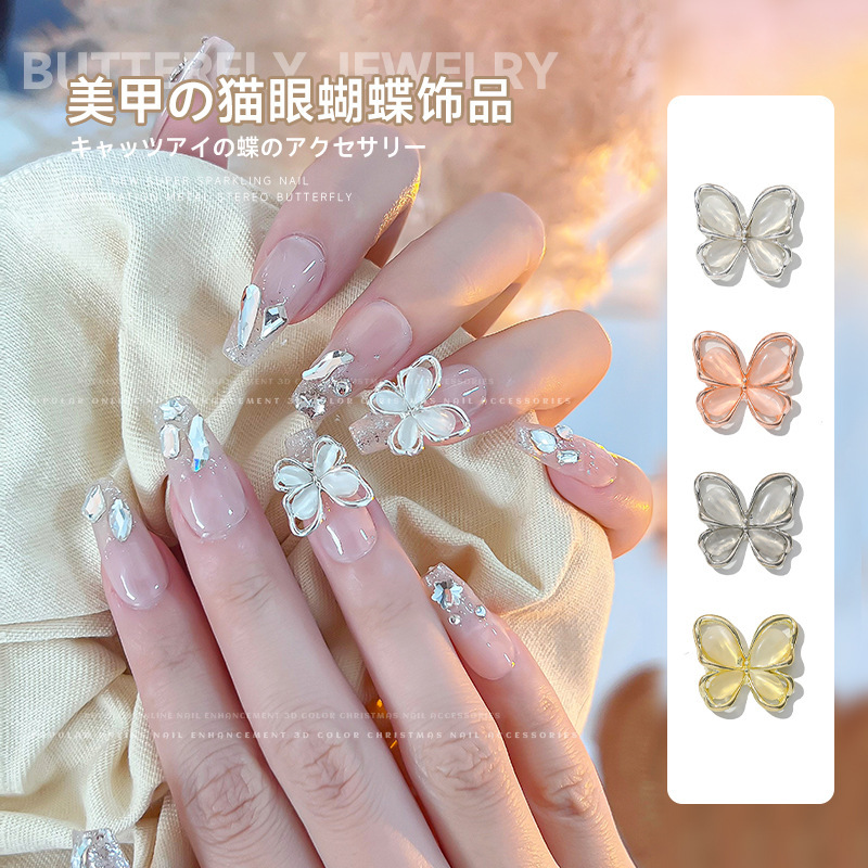 Online celebrity cat eye big butterfly nail jewelry three-dimensional ice transparent light luxury hollow alloy zircon nail drill Accessories Wholesale