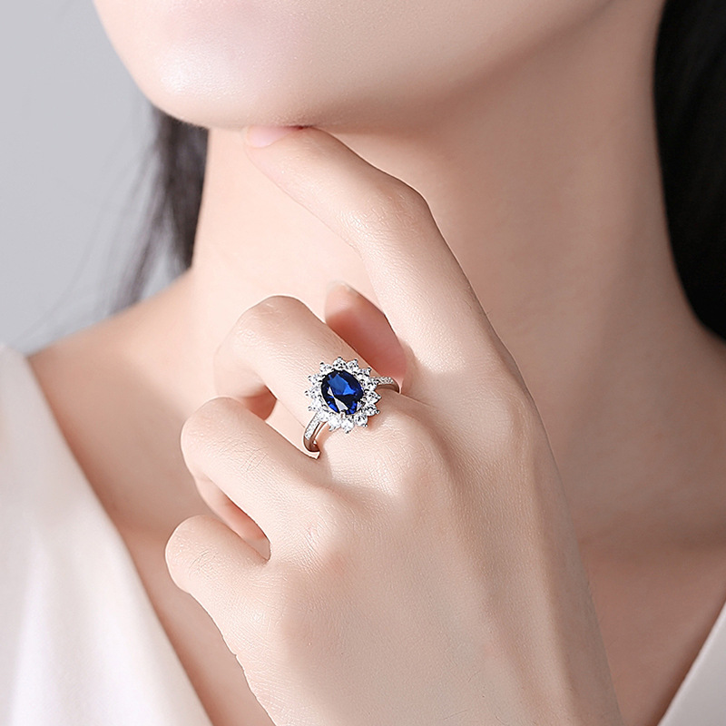 S925 plata esterlina nuevo colorido tesoro océano corazón con incrustaciones de zafiro grupo con incrustaciones de anillo de transmisión en vivo europeo y americano transfronterizo anillo de las mujeres