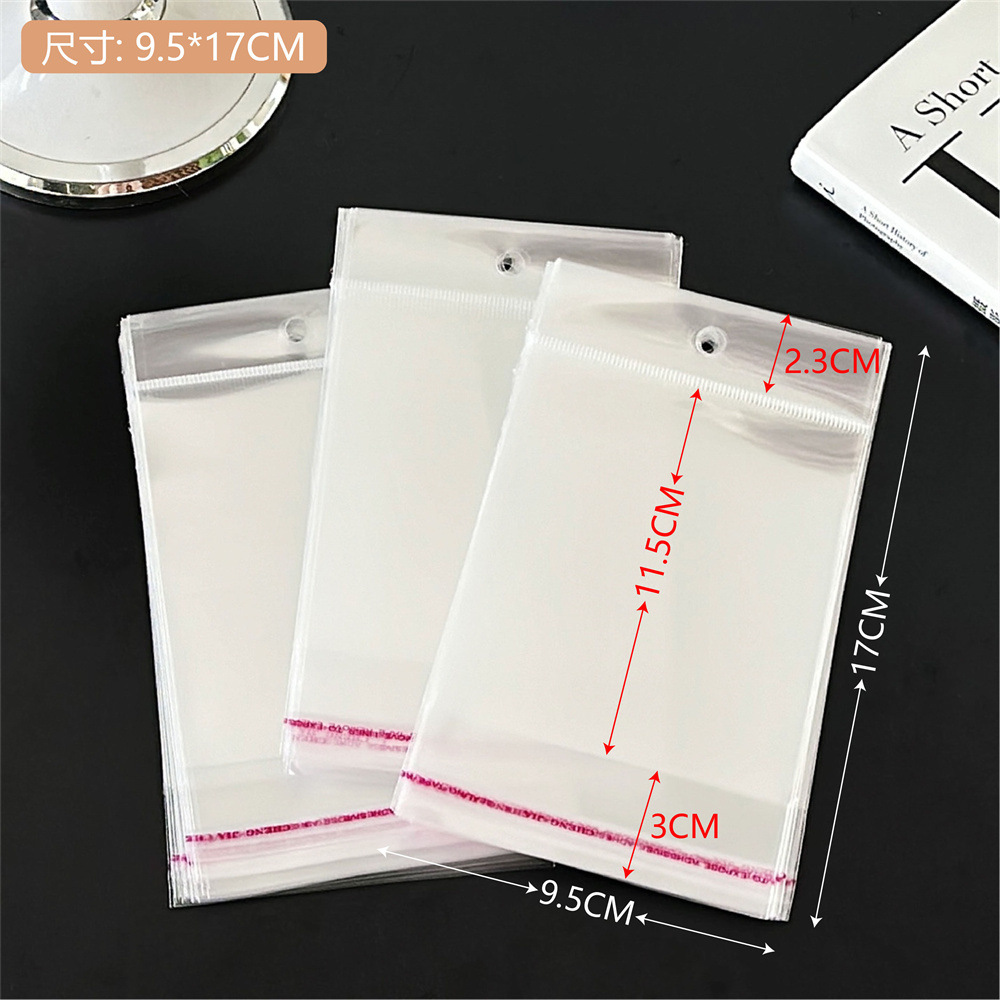 Colección de bolsas opp transparentes, cabeza de tarjeta, bolsa de embalaje trasera, bolsa de joyería pequeña, bolsa autoadhesiva con orificio colgante, bolsa de embalaje de plástico al por mayor