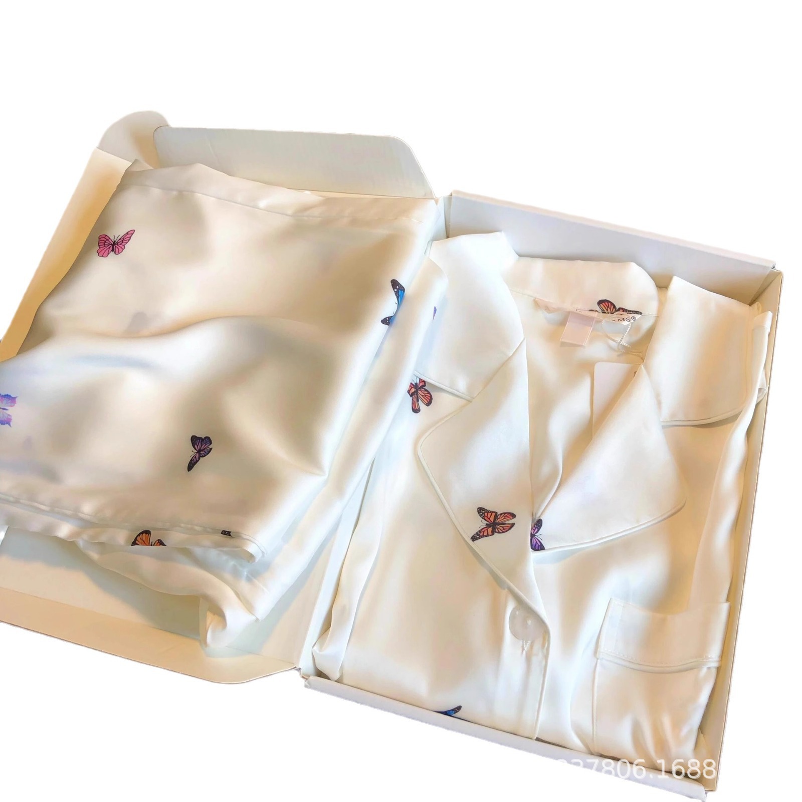 Butterfly imprimido pijama de primavera y otoño de mujeres nuevo 2025 seda de hielo ropa doméstica dos piezas de fábrica de comercio exterior transfronterizo