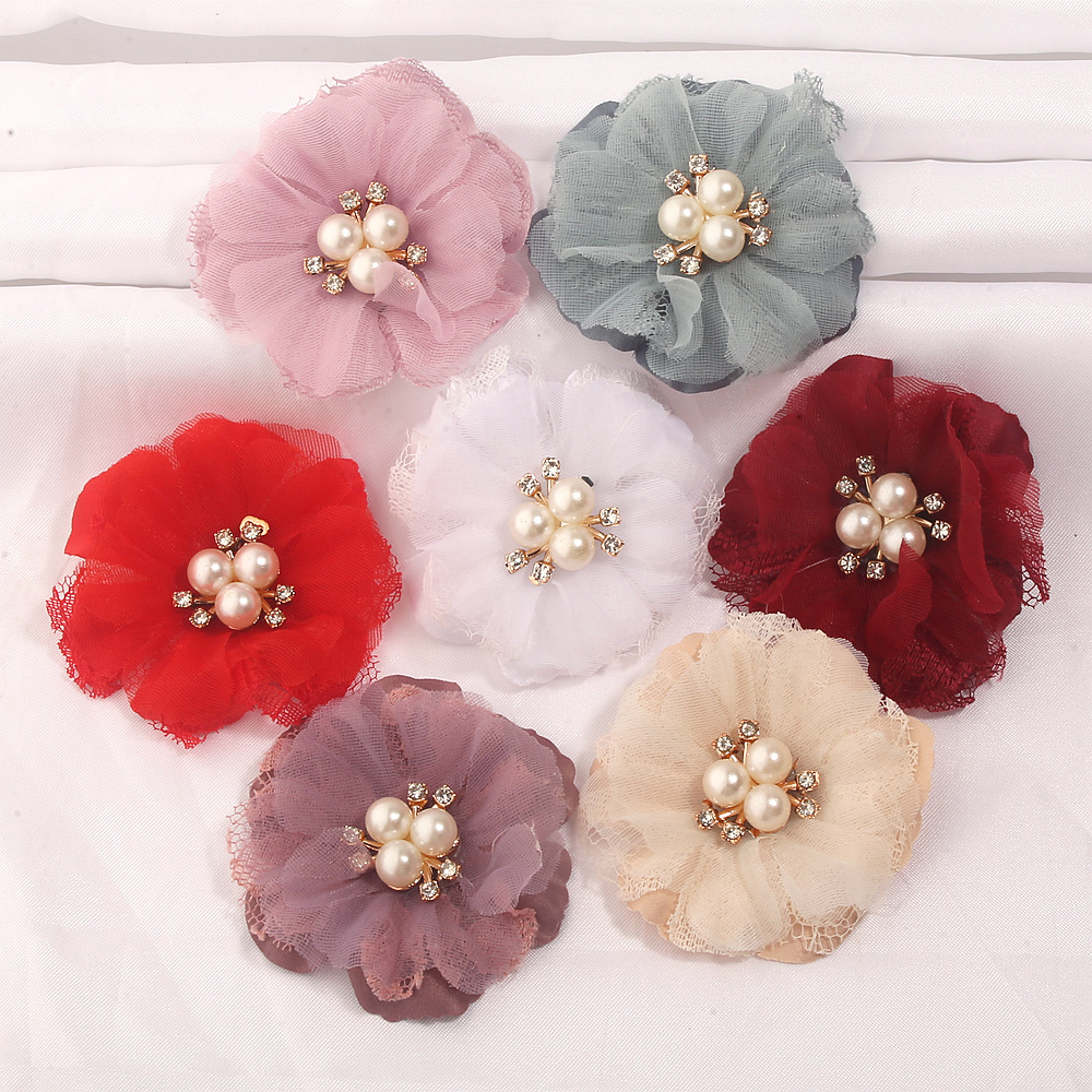 Manufacturer's in-stock fabric-shaped flowers for DIY handmade camellia accessories, shoe flowers, hair accessories, hairpin accessories, and floral components