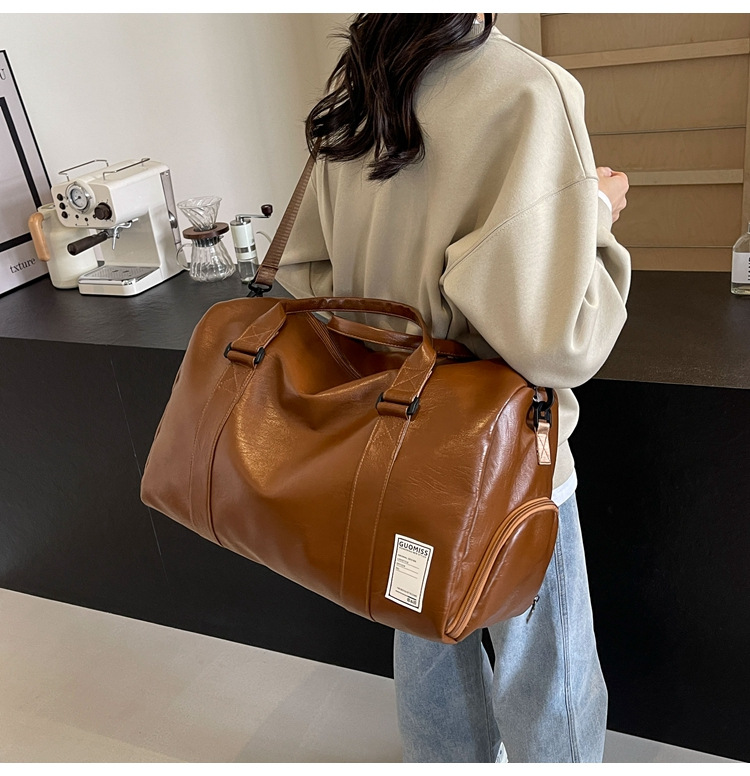 Men's high-end travel bag, large-capacity sports and fitness bag, women's leather travel clothes, luggage bag for men undefined
