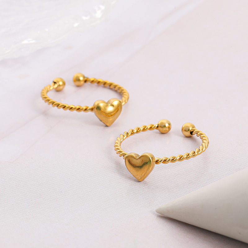 Fashionable ring with pigtail stainless steel heart shaped